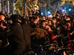 Police and people are pictured during some clashes in Shanghai. (AFP) Police and people are pictured during some clashes in Shanghai. (AFP)