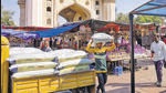A worker carries a sack of refined wheat flour towards a hotel in front of the landmark Charminar monument in Hyderabad, India, Thursday, Nov. 17, 2022. (AP Photo/Mahesh Kumar A.) (AP) A worker carries a sack of refined wheat flour towards a hotel in front of the landmark Charminar monument in Hyderabad, India, Thursday, Nov. 17, 2022. (AP Photo/Mahesh Kumar A.) (AP)