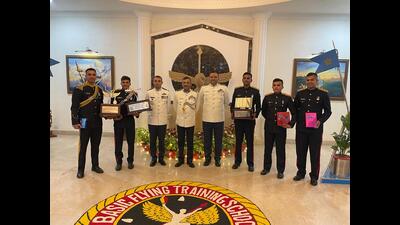 Graduating Army aviators who excelled in the training course pose with senior officers at BFTS-Prayagraj