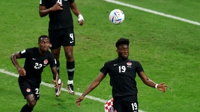 Canada's Alphonso Davies in action with Croatia's Josip Juranovic (REUTERS)