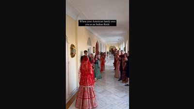 The image, taken from the viral Instagram video, shows the woman’s family looking at her. (Instagram/@biancalouzado)