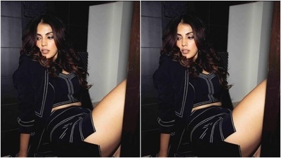 Styled by hairstylist Kimberly Chu, Rhea wore her tresses open in wavy curls with a middle part as she posed for the pictures. (Instagram/@rhea_chakraborty)