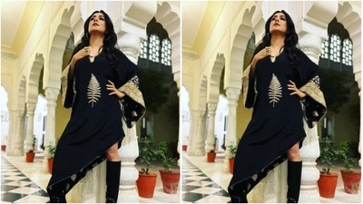 Mini looked stunning as ever in a black and gold kaftan-style dress. The attire featured a V-neckline, open sleeves and a slanting cut at the knees. (Instagram/@minimathur) Mini looked stunning as ever in a black and gold kaftan-style dress. The attire featured a V-neckline, open sleeves and a slanting cut at the knees. (Instagram/@minimathur)