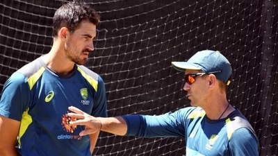 Australia fast bowler Mitchell Starc with former head coach Justin Langer (getty images) Australia fast bowler Mitchell Starc with former head coach Justin Langer (getty images)