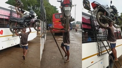 The man is balancing the bike on his head and climbing the ladder to reach the roof of the bus. (Twitter/@Gulzar_sahab) The man is balancing the bike on his head and climbing the ladder to reach the roof of the bus. (Twitter/@Gulzar_sahab)