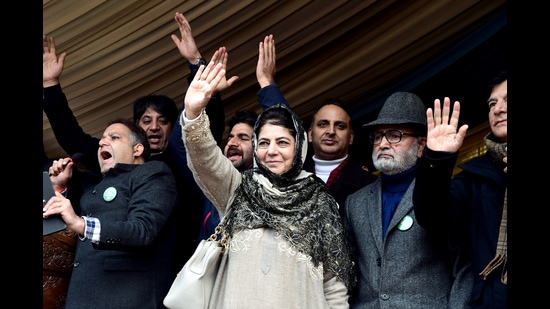 People’s Democratic Party chief Mehbooba Mufti waves to the supporters at a youth convention in Srinagar on Sunday. (ANI Photo)