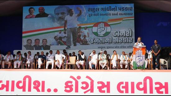 Surat, Nov 21 (ANI): Congress leader Rahul Gandhi addresses the public meeting for the upcoming Gujarat Assembly elections, in Surat on Monday. (ANI Photo) (ANI)