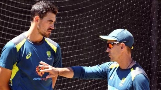 Australia fast bowler Mitchell Starc with former head coach Justin Langer(getty images)