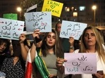 Israelis attend a demonstration in support of Iran protests in the Israeli coastal city of Tel Aviv on October 29. Israelis attend a demonstration in support of Iran protests in the Israeli coastal city of Tel Aviv on October 29.