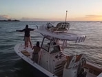 The image, taken from the Facebook video, shows the man and his finance on a boat.