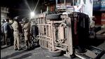 Police personnel gathered near an overturned police vehicle during an attack on Vizhinjam police station, in Thiruvananthapuram on Sunday. (ANI) Police personnel gathered near an overturned police vehicle during an attack on Vizhinjam police station, in Thiruvananthapuram on Sunday. (ANI)