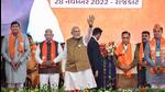 Prime Minister Narendra Modi waves at supporters during a public meeting ahead of Gujarat assembly elections, in Rajkot on Monday. (PTI) Prime Minister Narendra Modi waves at supporters during a public meeting ahead of Gujarat assembly elections, in Rajkot on Monday. (PTI)