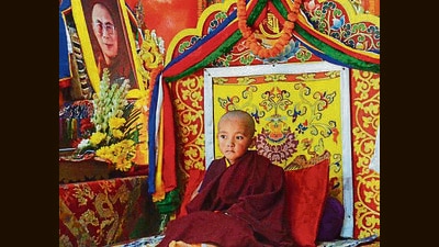 Rapten, who was born on April 16, 2018, was inducted into religious life by the Buddhist monk Namkhai Nyingpo Rinpoche of the Lhodrak Kharchu monastery of Bhutan, who tonsured Rapten’s head to ordain him as the new head of the Nyingma sect. (Deepak Sansta/ HT)