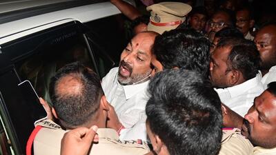 Telangana Bharatiya Janata Party president Bandi Sanjay Kumar being taken into custody by the police ahead of the fifth leg of his "Praja Sangrama Yatra", in Nirmal on Sunday. (Agencies) Telangana Bharatiya Janata Party president Bandi Sanjay Kumar being taken into custody by the police ahead of the fifth leg of his "Praja Sangrama Yatra", in Nirmal on Sunday. (Agencies)