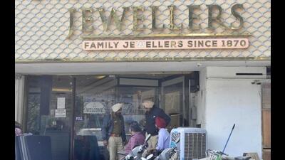 The raids were carried out at Nikkamal Jewellers on Mall road, Sardar Jewellers near Aarti chowk and Mani Ram Balwant Rai (departmental store having its main branch near Kailash Cinema chowk) in Ludhiana. (HT PHOTO)