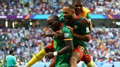 Cameroon's Vincent Aboubakar and teammate celebrates their third goal, scored by Eric Maxim Choupo-Moting. (REUTERS)