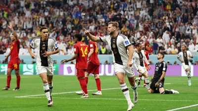 Germany's Niclas Fullkrug celebrates scoring their first goal with Jamal Musiala. (REUTERS)