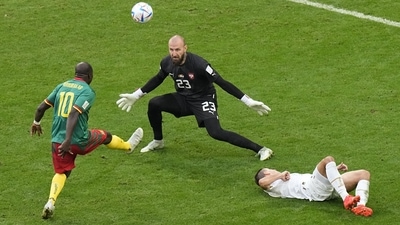 Vincent Aboubakar scores past Serbia's goalkeeper Vanja Milinkovic-Savic during the FIFA World Cup Group G match between Cameroon and Serbia, at the Al Janoub Stadium in Al Wakrah. (AP) Vincent Aboubakar scores past Serbia's goalkeeper Vanja Milinkovic-Savic during the FIFA World Cup Group G match between Cameroon and Serbia, at the Al Janoub Stadium in Al Wakrah. (AP)
