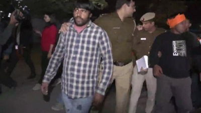 The clarification came soon after disturbing visuals shared by news agency ANI of two men - one with a saffron headband - brandishing swords and forcing the van to stop. (ANI)