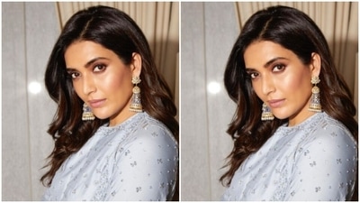 Styled by fashion stylist Shrushti Gupta, Karishma wore her tresses open in wavy curls with a side part. (Instagram/@karishmaktanna) Styled by fashion stylist Shrushti Gupta, Karishma wore her tresses open in wavy curls with a side part. (Instagram/@karishmaktanna)