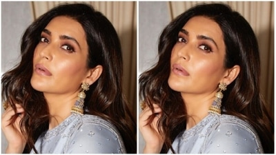 Karishma decked up in a pastel blue salwar featuring closed neckline, quarter sleeves and silver sequin details throughout. (Instagram/@karishmaktanna) Karishma decked up in a pastel blue salwar featuring closed neckline, quarter sleeves and silver sequin details throughout. (Instagram/@karishmaktanna)