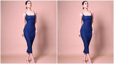 On Sunday night, Vaani Kapoor posted pictures of herself on Instagram with the caption, "Syncing pictures with my mood...unfiltered." The photos show Vaani dressed in a dark blue figure-hugging dress and serving stunning poses for the camera. The ensemble is from the shelves of a British luxe clothing label Vesper. (Instagram)