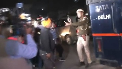 The attackers were shouting slogans and attempting to enter the police van. (ANI)