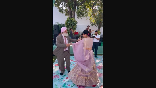 The image, taken from the Instagram video, shows the daughter dancing to Uptown Funk with her dad.(Instagram/@gitanasingh)