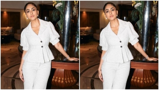 Mrunal wore a white sequined shirt with lapel collar, half puff sleeves and pleated detail, with a V-neckline. (Instagram/@mrunalthakur)