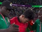 Ghana coach embarrasses himself as he tries to take a selfie with sobbing Son Heung-min after South Korea's defeat(Twitter) Ghana coach embarrasses himself as he tries to take a selfie with sobbing Son Heung-min after South Korea's defeat(Twitter)