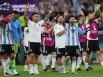 Argentina's Lautaro Martinez and Lionel Messi celebrate after the match 