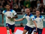 England's Marcus Rashford, left, celebrates with teammates after scoring the opening goal during the FIFA World Cup group B match between England and Wales, at the Ahmad Bin Ali Stadium in Al Rayyan.(AP) England's Marcus Rashford, left, celebrates with teammates after scoring the opening goal during the FIFA World Cup group B match between England and Wales, at the Ahmad Bin Ali Stadium in Al Rayyan.(AP)