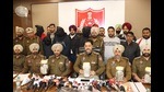 The accused of <span class='webrupee'>₹</span>17.85 lakh heist from UCO Bank in Ghanaur in police custody. (HT Photo) The accused of <span class='webrupee'>₹</span>17.85 lakh heist from UCO Bank in Ghanaur in police custody. (HT Photo)
