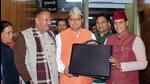 Uttarakhand chief minister Pushkar Singh Dhami with other cabinet ministers at the state legislative assembly in Dehradun on Tuesday (PTI) Uttarakhand chief minister Pushkar Singh Dhami with other cabinet ministers at the state legislative assembly in Dehradun on Tuesday (PTI)
