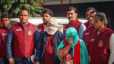 A team of the Crime Branch, RK Puram, arrested a woman and her son for allegedly killing her husband and chopping the body into pieces in her house at Trilokpuri in New Delhi on Monday. (HT Photo) A team of the Crime Branch, RK Puram, arrested a woman and her son for allegedly killing her husband and chopping the body into pieces in her house at Trilokpuri in New Delhi on Monday. (HT Photo)