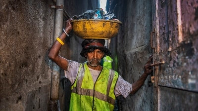 Birju, 58, during the special cleanliness drive in Mumbai, on November 25. On a daily average, the SWM workers collect about five metric tonnes of waste. (Satish Bate / HT Photo) Birju, 58, during the special cleanliness drive in Mumbai, on November 25. On a daily average, the SWM workers collect about five metric tonnes of waste. (Satish Bate / HT Photo)