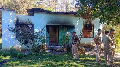 West Karbi Anglong: Security personnel stand guard near a forest office, a day after it was vandalised and burnt down by miscreants following violence at a disputed Assam-Meghalaya border location that killed six people, in West Karbi Anglong district, Wednesday, Nov. 23, 2022. (PTI Photo)(PTI11_23_2022_000162A) (PTI) West Karbi Anglong: Security personnel stand guard near a forest office, a day after it was vandalised and burnt down by miscreants following violence at a disputed Assam-Meghalaya border location that killed six people, in West Karbi Anglong district, Wednesday, Nov. 23, 2022. (PTI Photo)(PTI11_23_2022_000162A) (PTI)