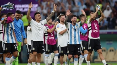 Argentina's Lautaro Martinez and Lionel Messi celebrate after the match (REUTERS)