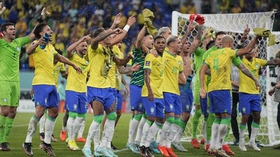 Brazil players celebrate at the end of the World Cup group G match (AP) Brazil players celebrate at the end of the World Cup group G match (AP)
