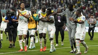 Senegal players react after the World Cup group A match between Ecuador and Senegal, at the Khalifa International Stadium in Doha (AP) Senegal players react after the World Cup group A match between Ecuador and Senegal, at the Khalifa International Stadium in Doha (AP)