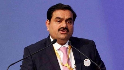 Gautam Adani: He is the Chairperson of Adani Group with a net worth of <span class='webrupee'>₹</span>1,211,460.11 crore. He has become India's richest person for the first time this year. (File Photo) Gautam Adani: He is the Chairperson of Adani Group with a net worth of <span class='webrupee'>₹</span>1,211,460.11 crore. He has become India's richest person for the first time this year. (File Photo)