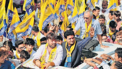 AAP’s chief ministerial candidate Isudan Gadhvi during a roadshow in Jamjodhpur on Tuesday.