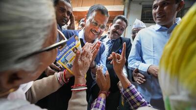 Delhi chief minister and AAP convener Arvind Kejriwal greets supporters during a door-to-door election campaign for the upcoming MCD elections, at Chirag Delhi on Tuesday. (PTI) Delhi chief minister and AAP convener Arvind Kejriwal greets supporters during a door-to-door election campaign for the upcoming MCD elections, at Chirag Delhi on Tuesday. (PTI)
