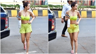Malaika's neon green sports bra features barely-there halter straps, racerback details, a fitted bust, a plunging U neckline flaunting her décolletage, and a cropped hemline baring the star's toned midriff. (HT Photo/Varinder Chawla) Malaika's neon green sports bra features barely-there halter straps, racerback details, a fitted bust, a plunging U neckline flaunting her décolletage, and a cropped hemline baring the star's toned midriff. (HT Photo/Varinder Chawla)