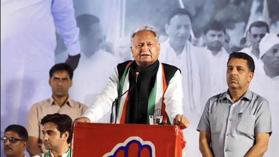 Ahmedabad: Rajasthan chief minister and senior Congress leader Ashok Gehlot addresses a public meeting while campaigning for the Gujarat Assembly elections in Ahmedabad, Monday night. (PTI)