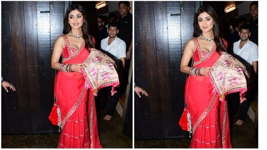 Shilpa Shetty was earlier spotted outside Sunita Kapoor's residence for Karwachaut celebrations in a red sheer saree paired with a sleeveless brocade blouse.(HT Photo/Varinder Chawla)