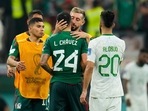 Mexico's Hector Herrera, center right, hugs Luis Chavez, center, after the FIFA World Cup group C soccer match between Saudi Arabia and Mexico, at the Lusail Stadium in Lusail.(AP) Mexico's Hector Herrera, center right, hugs Luis Chavez, center, after the FIFA World Cup group C soccer match between Saudi Arabia and Mexico, at the Lusail Stadium in Lusail.(AP)