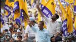Arvind Kejriwal during a roadshow in Surat. (Twitter) Arvind Kejriwal during a roadshow in Surat. (Twitter)