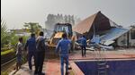 Noida authority officials dismantle an illegal farmhouse at Yamuna Khadar on Wednesday. (PTI) Noida authority officials dismantle an illegal farmhouse at Yamuna Khadar on Wednesday. (PTI)