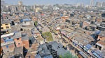 Dharavi sits on 240 hectares of prime land in the heart of Mumbai and its redevelopment, first proposed formally by the then Congress chief minister Sushil Kumar Shinde in 2004, involves rehabilitation of more than 60,000 families and 13,000 commercial units in tenements of 405 sq ft. (Satish Bate/HT PHOTO) Dharavi sits on 240 hectares of prime land in the heart of Mumbai and its redevelopment, first proposed formally by the then Congress chief minister Sushil Kumar Shinde in 2004, involves rehabilitation of more than 60,000 families and 13,000 commercial units in tenements of 405 sq ft. (Satish Bate/HT PHOTO)